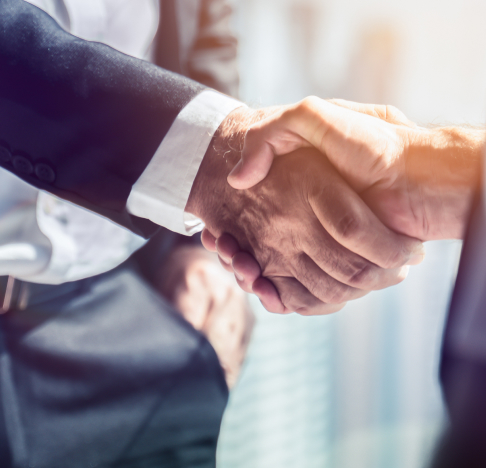 handshake between two people handshake between two people